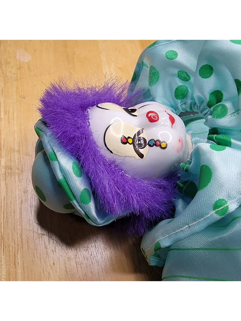 Vintage Porcelain Clown Doll with Purple Hair and Polka Dot Outfit